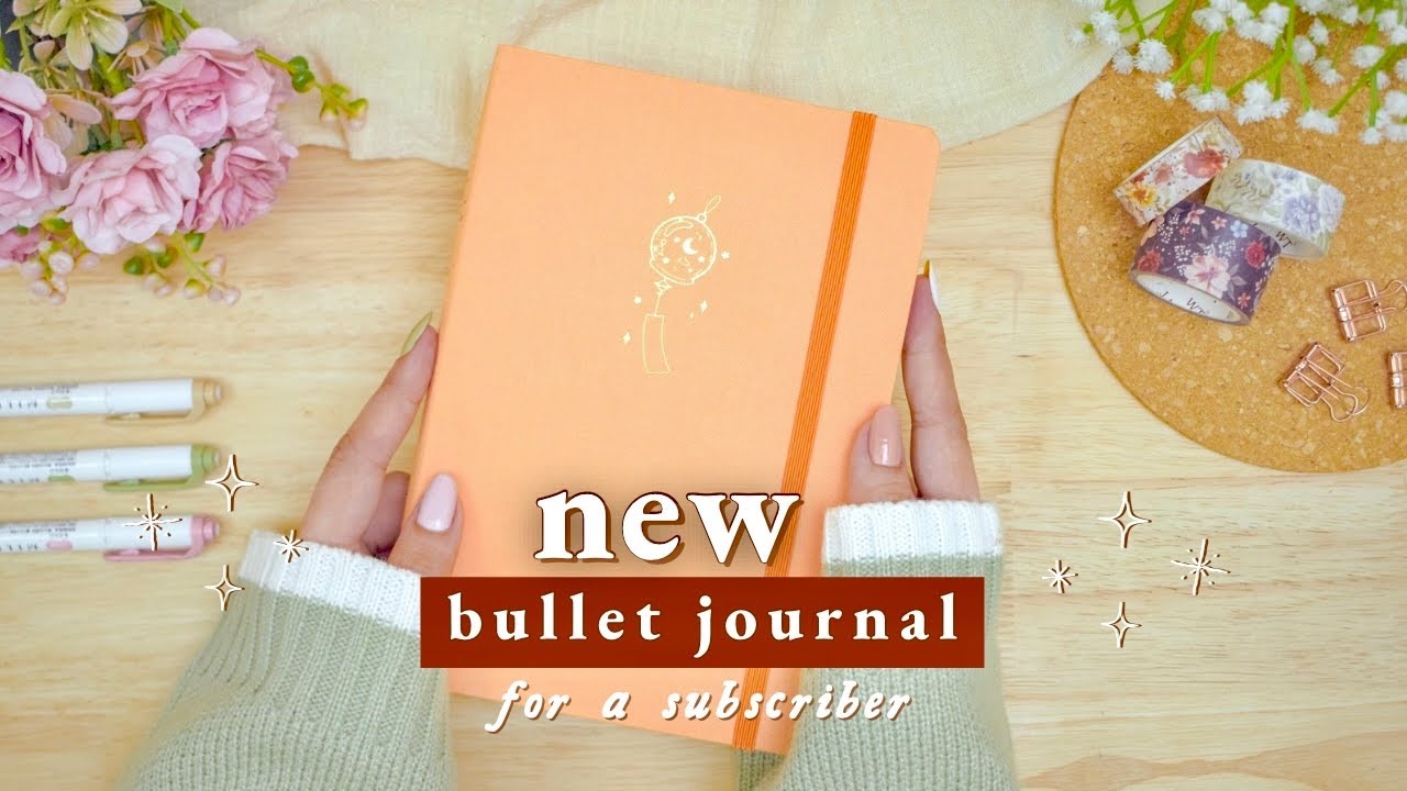 YouTube post by @CharizzeT for Paperwrld. Caption reads: New Bullet Journal Setup 2024 GIVEAWAY • 🌷📓 Mid....