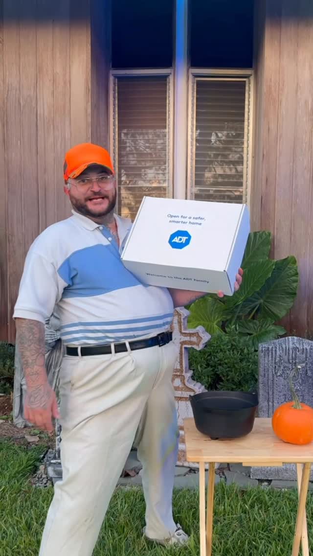 Instagram post by @danethegreatt for ADT. Caption reads: #ADTPartner #ADTAd Southern dad’s safe Halloween....