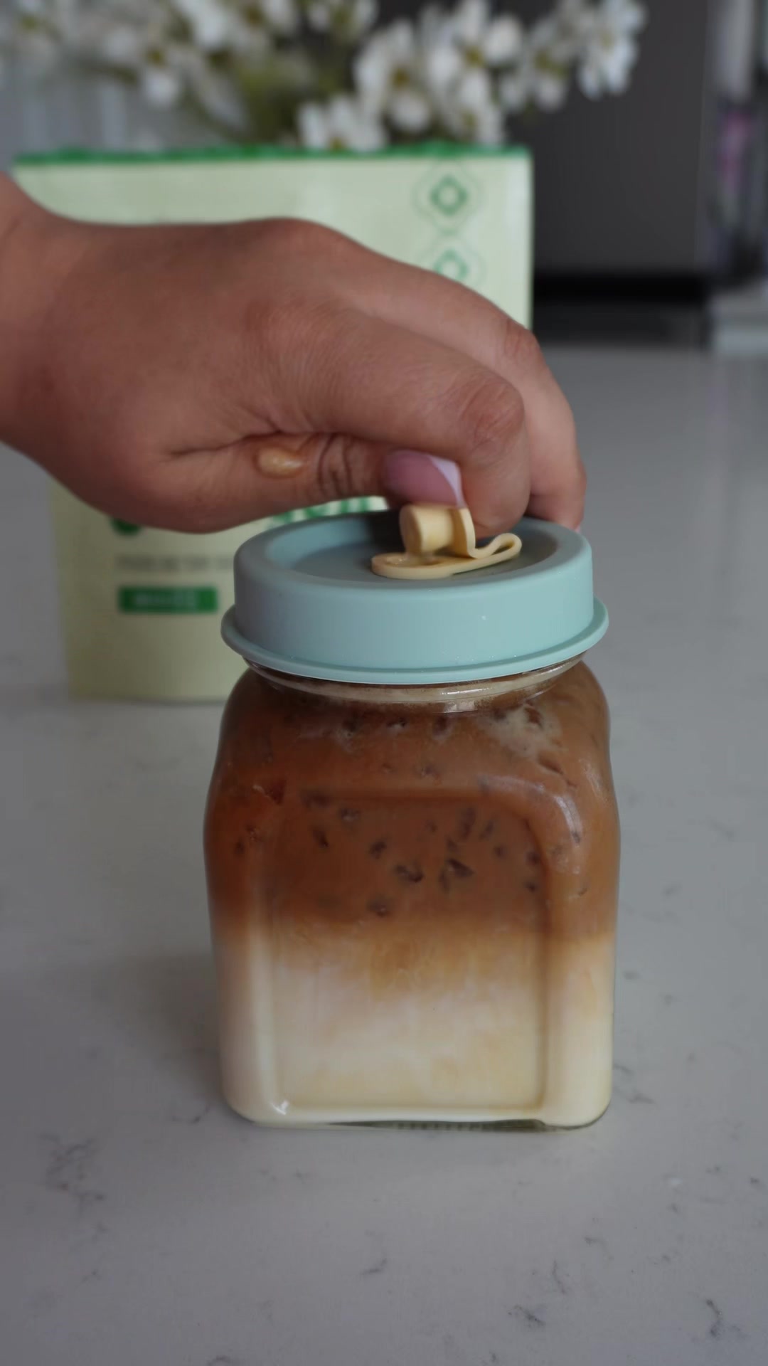 TikTok post by @__adilene__ for Crushed Tonic. Caption reads: [...] Banana latte is my favorite! @Crushed Tonic....