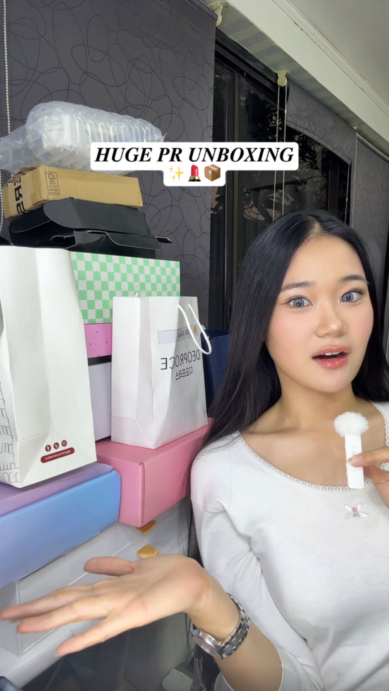 Instagram post by @ellecalara for Medicube. Caption reads: HUGE pr unboxing with all these lovely brands 💗....