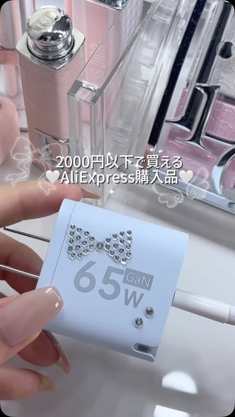 Instagram post by @nata_mi100 for AliExpress. Caption reads: AliExpressで見つけた便利アイテム🎀 全部2,000円以下で買えて、 [...].