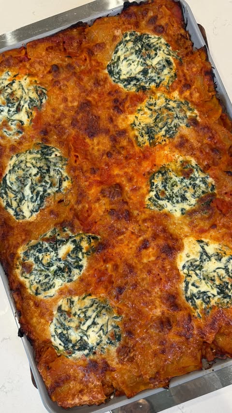 Instagram post by @tuttorossotomatoes for The Feedfeed. Caption reads: (ad) This Ultimate Sheet Pan Lasagna with....