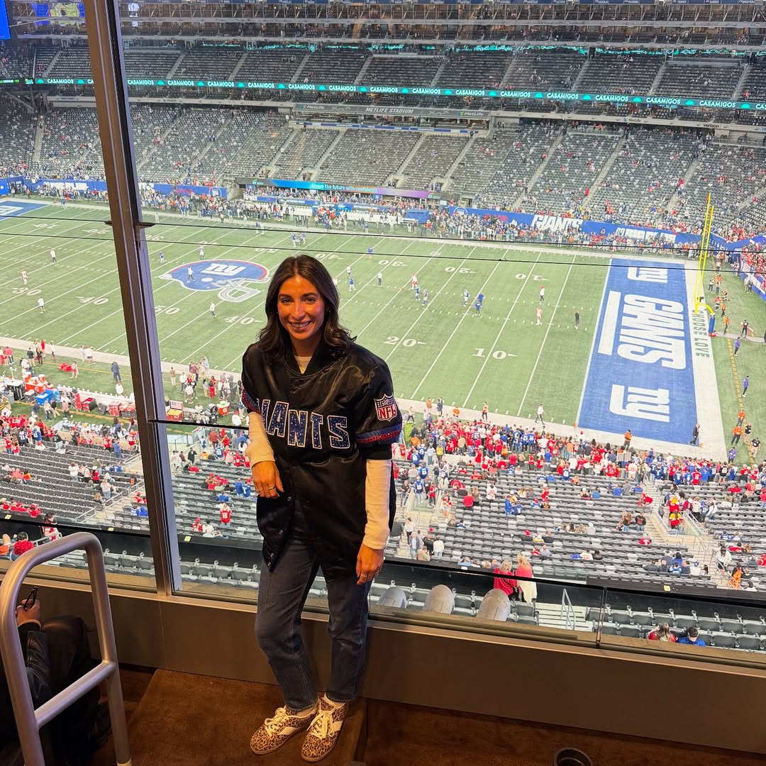 Instagram post by @newyorkgiantsfangirl for Starter. Caption reads: Suite life with @starterofficial in my custom....