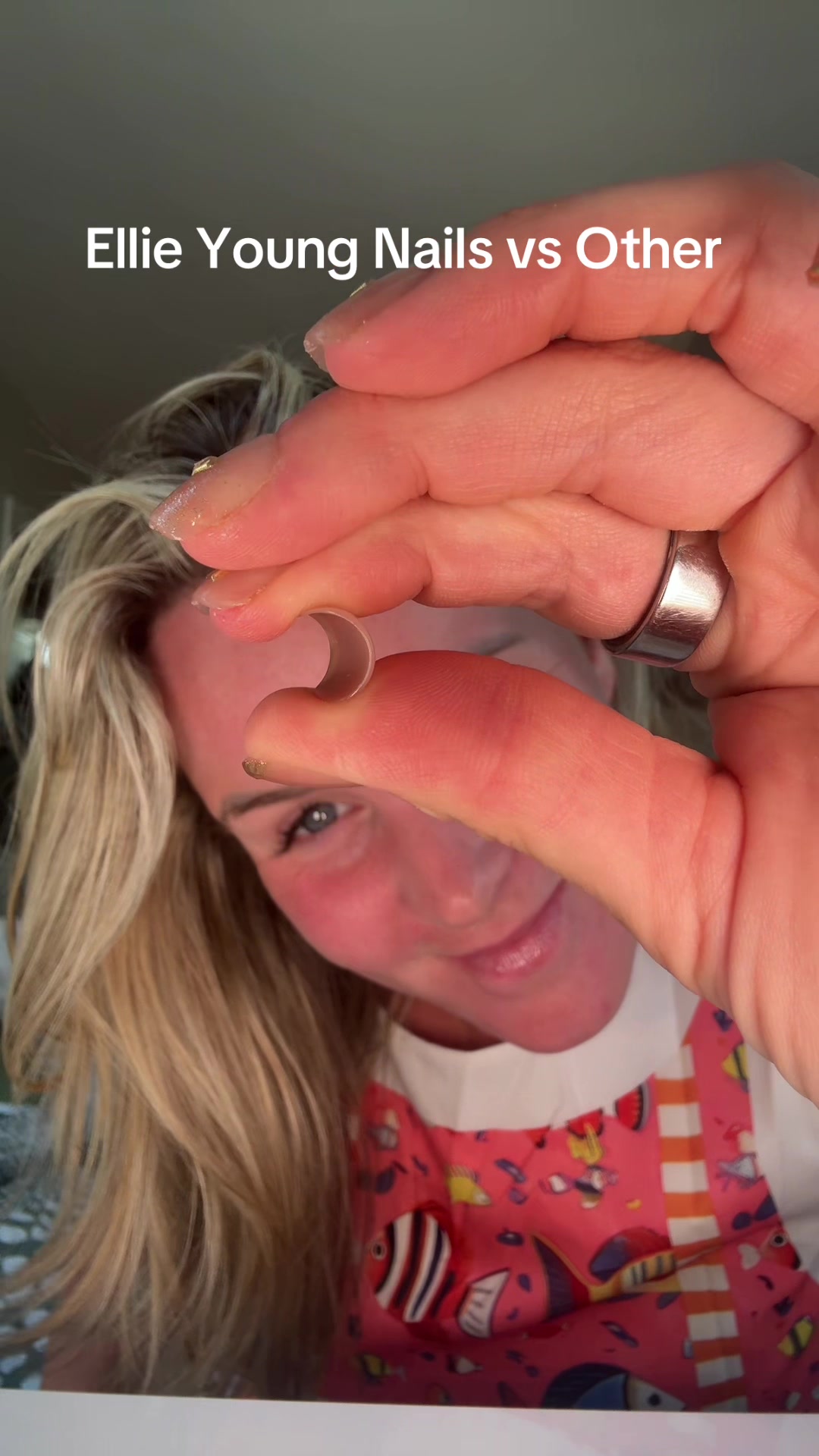 TikTok post by @emmatwinmum for Ellie Young Beauty Shop. Caption reads: Testing the @Ellie Young Nails Ltd against other....