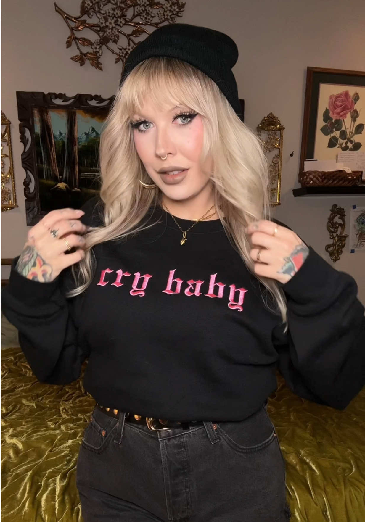 TikTok post by @greenreaper.xo for In Stitches Apparel. Caption reads: 🥲💖 @In Stitches Apparel #altmom #tattooedmom....