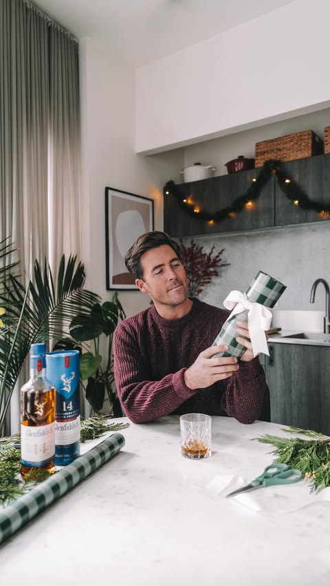 Instagram post by @johnphilp3 for Glenfiddich. Caption reads: [...] is caring! AD 🎁🎄Giving the gift of....