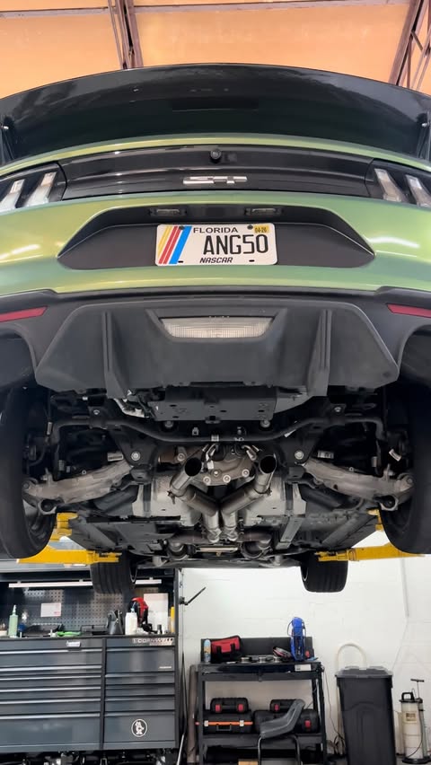 Instagram post by @angs5.0 for AWE Tuning. Caption reads: [...] Fiber • Sponsors: ~ @braumracing ~....