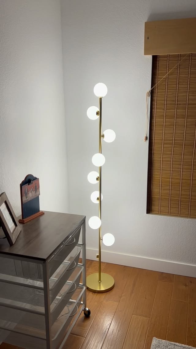 Instagram post by @llcoolaj13 for Ozarke. Caption reads: [...] our big move and this floor lamp from....