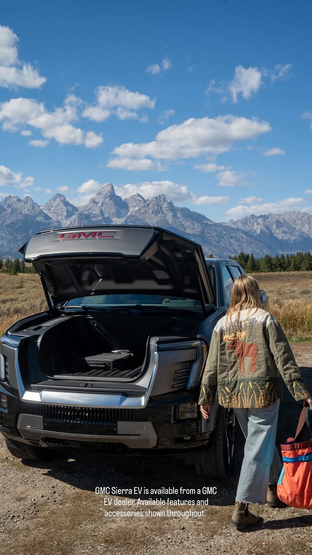 Instagram post by @nicolekauffmann for GMC. Caption reads: Less waiting, more going. The @gmc Sierra EV takes....