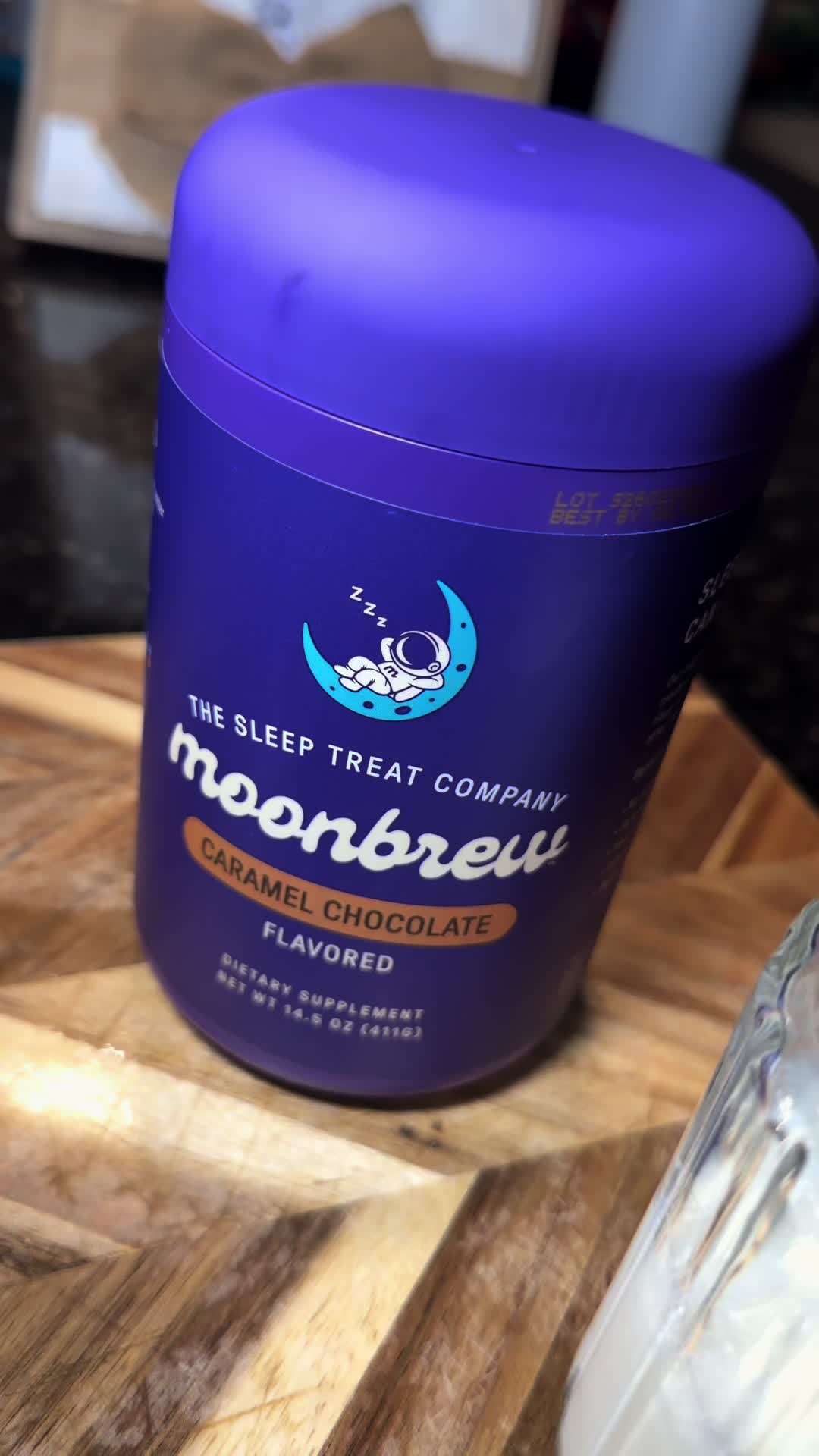 TikTok post by @l_torres077 for MoonBrew. Caption reads: My new cozy nighttime ritual 🌙🍫 MoonBrew Caramel....