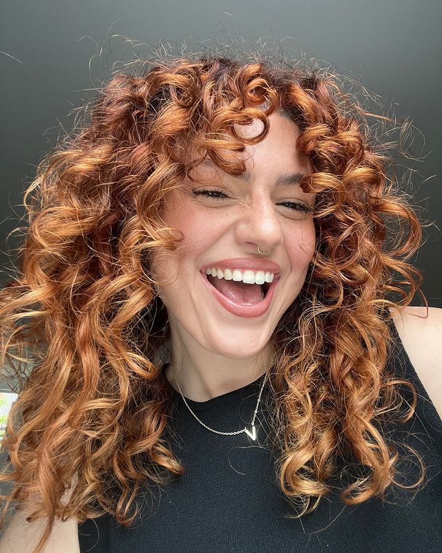 Instagram post by @brittminetti for Aussie Hair. Caption reads: always a good hair day w/ @aussiehairusa....