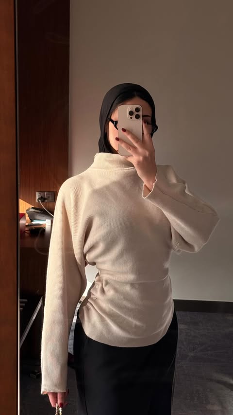 Instagram post by @aya__samiir for Cider. Caption reads: Outfit of the day🤎

Knitwear from @shopcider use....