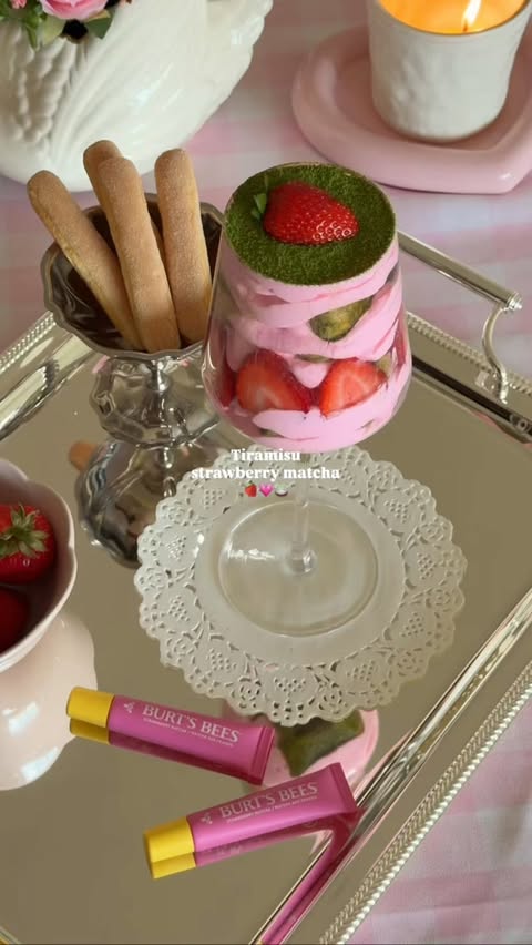 Instagram post by @michelechung_ for Burt's Bees. Caption reads: [...] Strawberry Matcha lip squeezies from....