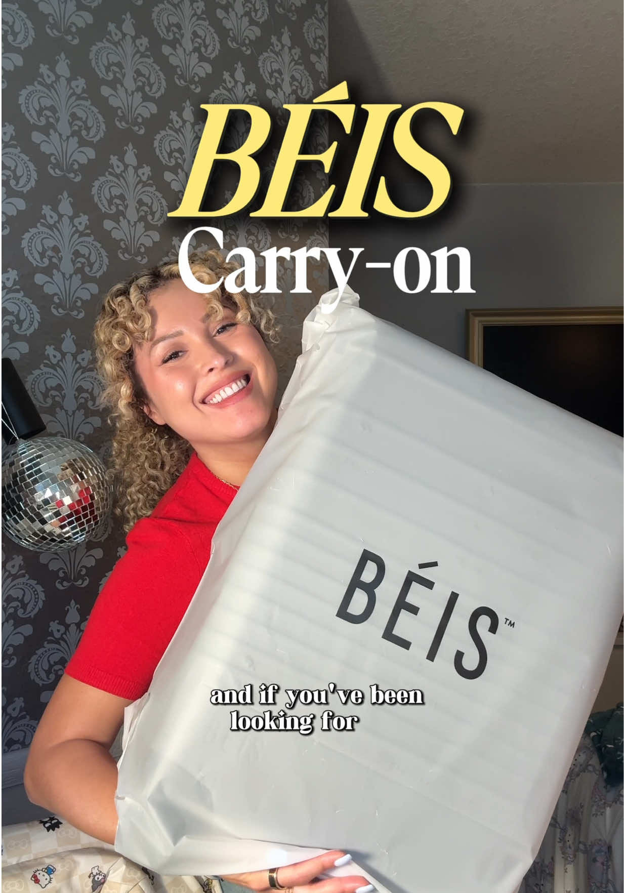 TikTok post by @melissa.spiffy for BÉIS Travel. Caption reads: I’ve been waiting for this one!!!!  @BÉIS carry-on....