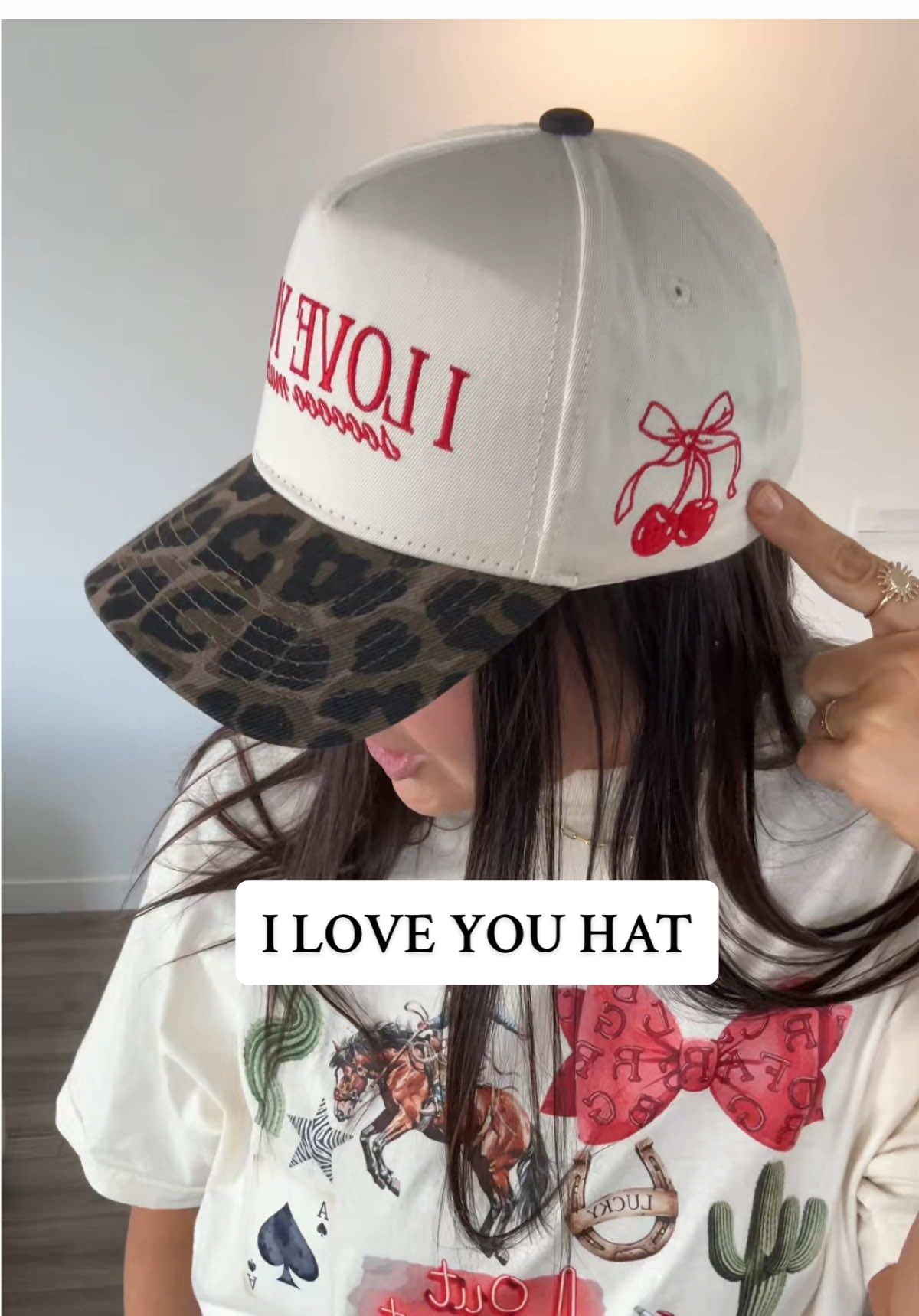 TikTok post by @shelbfoster for KenzKustomz. Caption reads: THE CUTEST TRUCKER HAT @KenzKustomz....