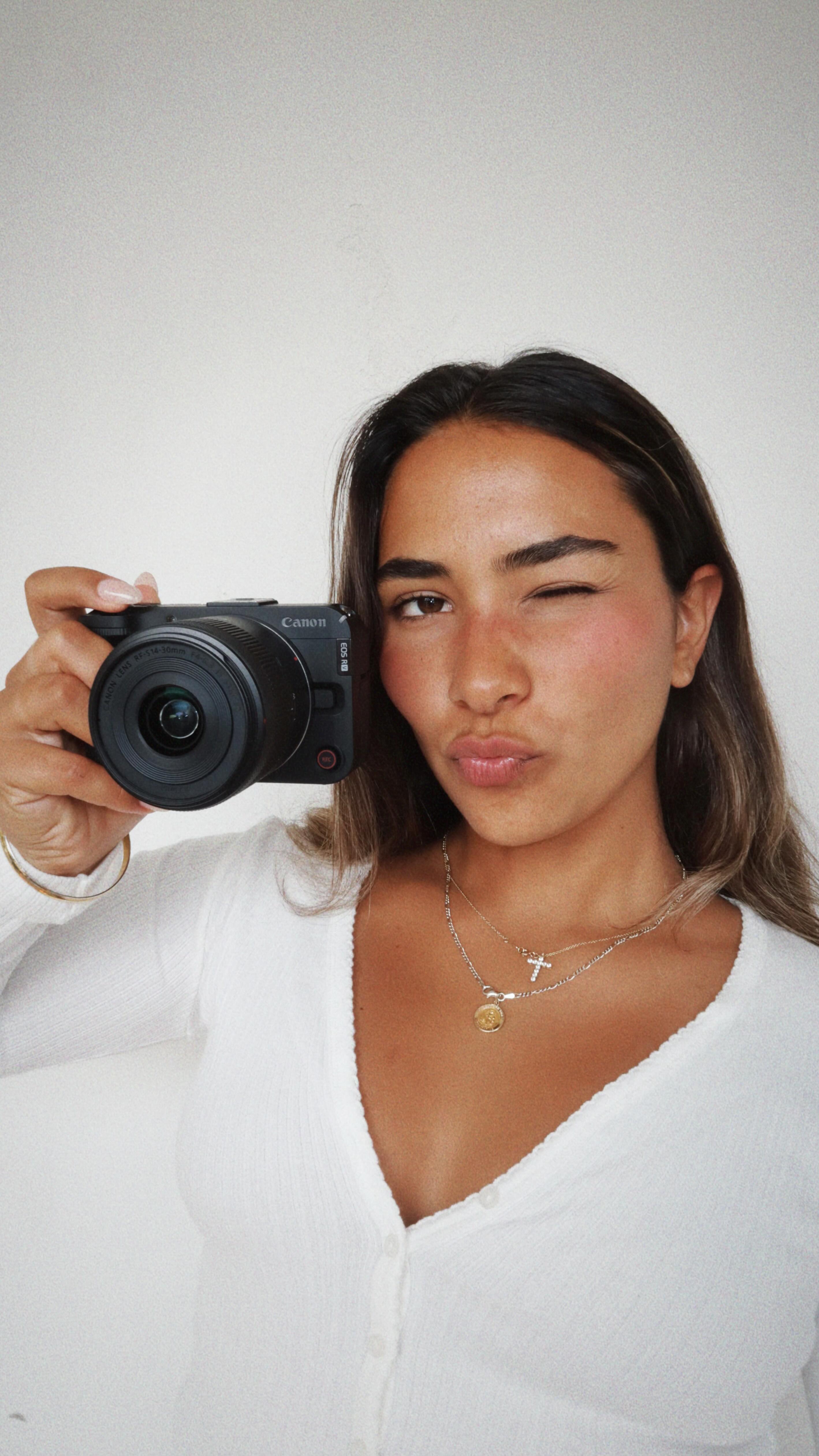 Instagram post by @siennamaegomez for Canon USA. Caption reads: ✨ Canon x Sienna Sweepstakes ✨ Are you looking to....
