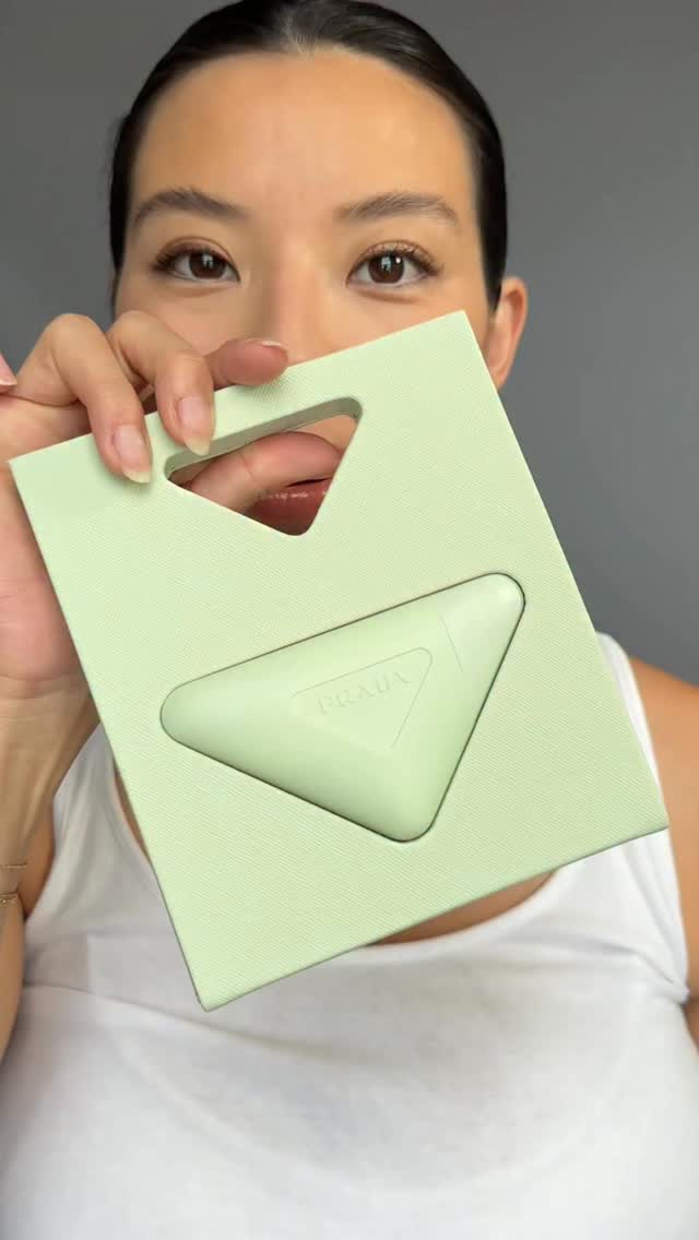 Instagram post by @mexicanbutjapanese for Prada Beauty. Caption reads: The @pradabeauty handcream everyone ☁️.