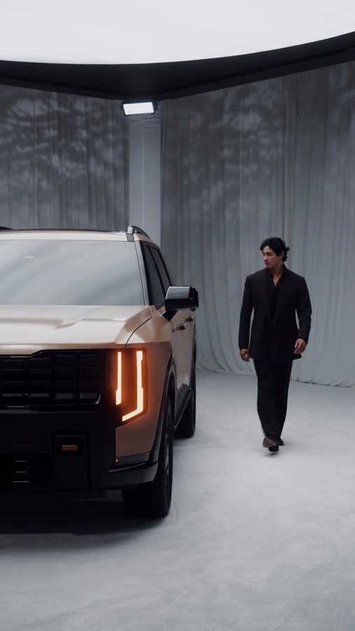 Instagram post by @isaacbramirez for Kia. Caption reads: Introducing the all-new next-generation 2027....