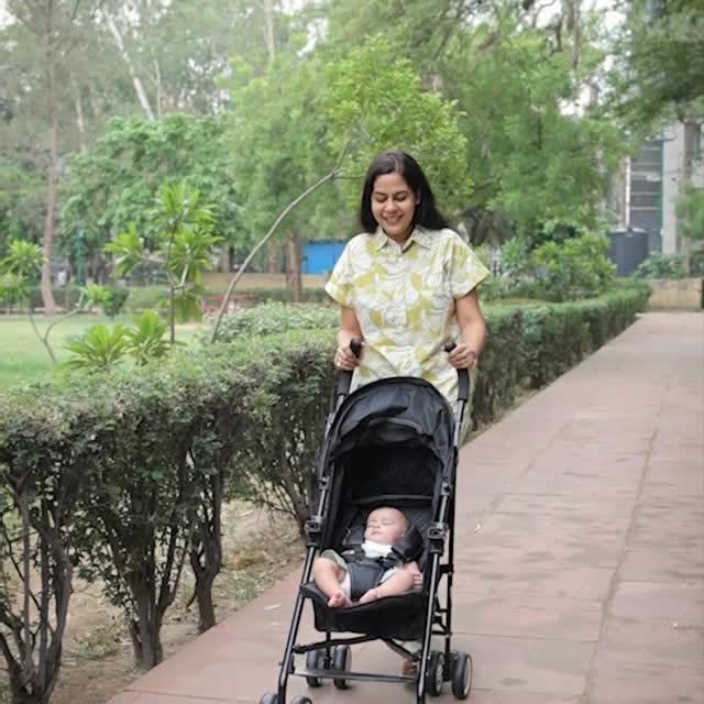 Instagram post by @taurus.ayushi for LuvLap. Caption reads: Tried strollers that were either bulky or tricky —....