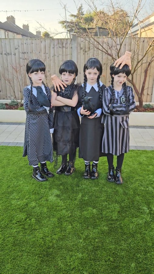 Instagram post by @crozierquadsplus1 for Smiffys. Caption reads: A chaotic, costume-filled morning for Book Day....