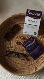 Instagram post by @hollyrebeccawhite for Perfectil. Caption reads: [...] loving taking my daily @vitabiotics....