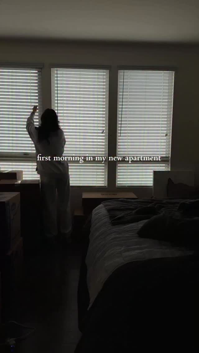 Instagram post by @caitiejune_ for World Market. Caption reads: opening my windows is a full time job....