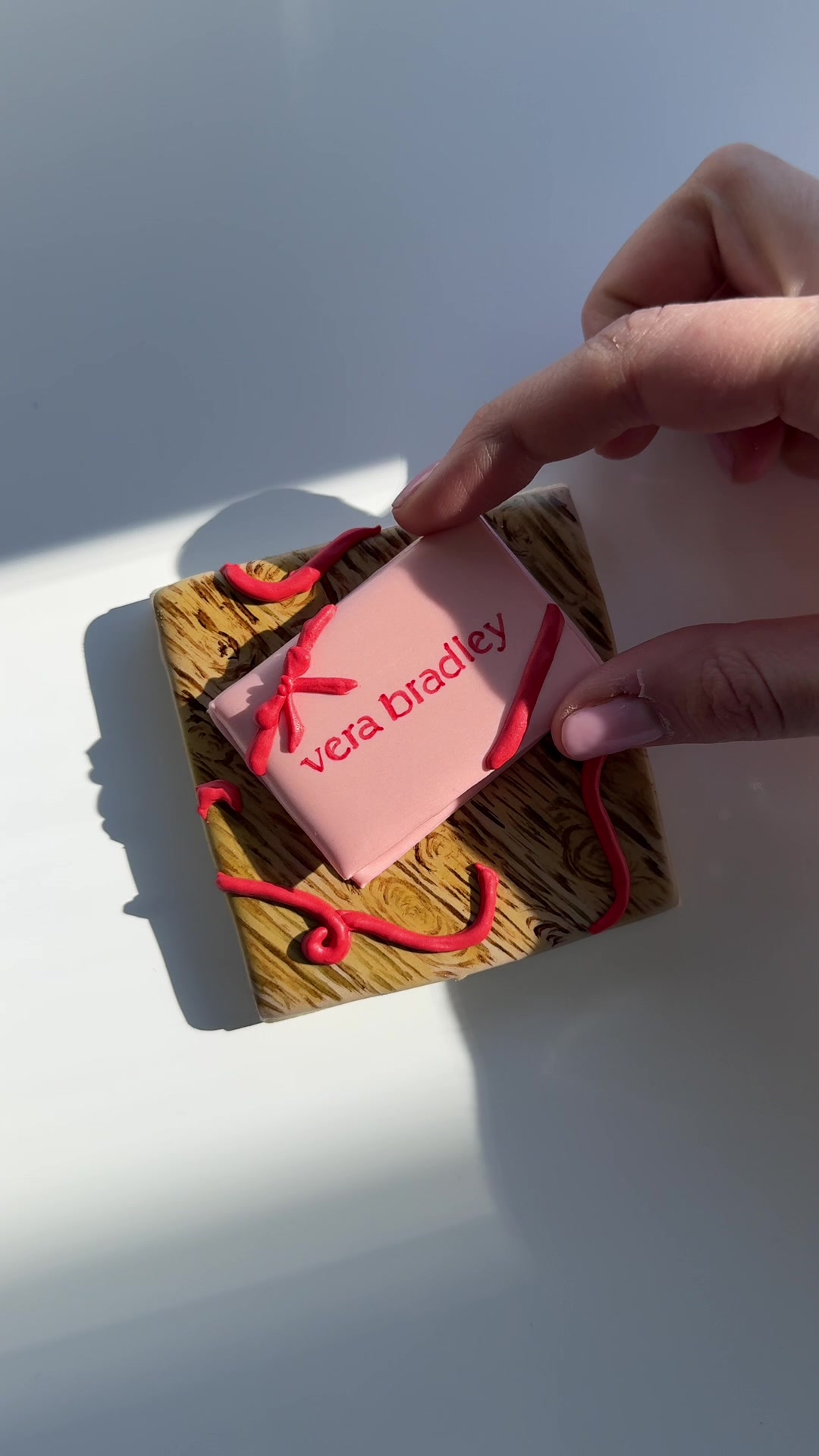 TikTok post by @angelbakednyc for Vera Bradley. Caption reads: [...] than cookies, Christmas, and @Vera Bradley .