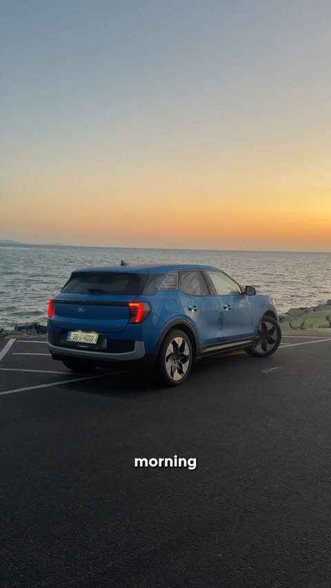 Instagram post by @oisin.c for Ford. Caption reads: [...] Travelling with the All-Electric Ford....
