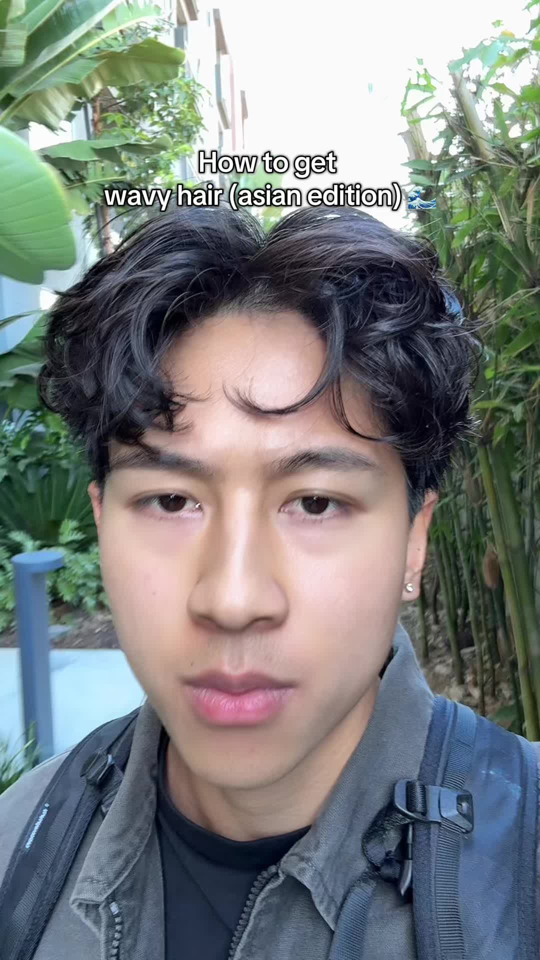 TikTok post by @kbwelll for Based BodyWorks. Caption reads: Pomade me #hairtutorial #mensgrooming #middlepart....
