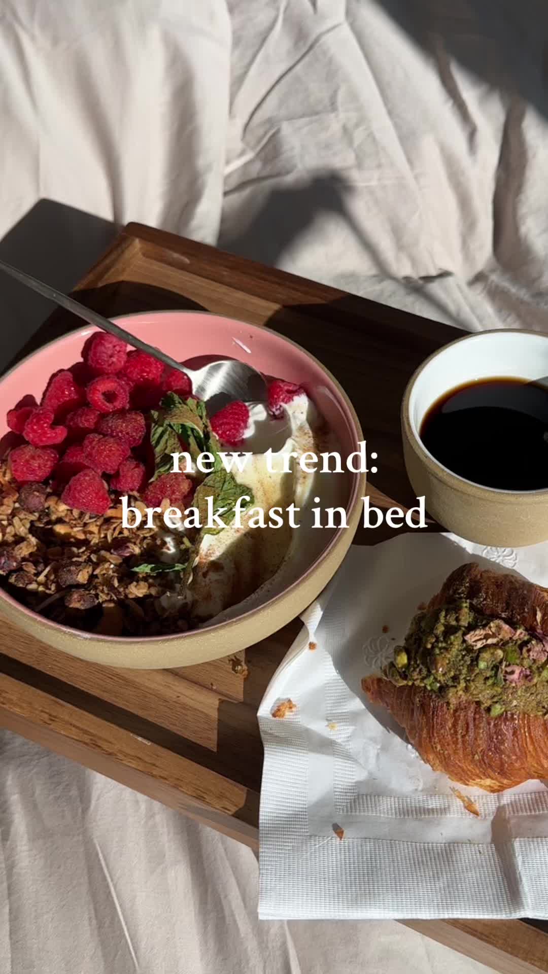 TikTok post by @ryannordheimer for Brooklinen. Caption reads: deluxe breakfast in bed 🥐 could not be more....