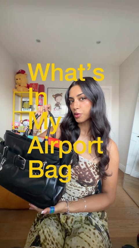 Instagram post by @mazullah for Holafly. Caption reads: [...] important thing in my airport bag is....