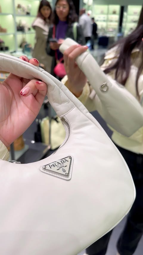 Instagram post by @lulasafira for Bicester Village. Caption reads: Got some good stuff 🛍️....