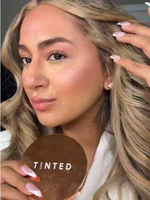 TikTok post by @sanabanaaa for LIVE TINTED. Caption reads: @Live Tinted huebeam blushing bronzer IS STAYING....