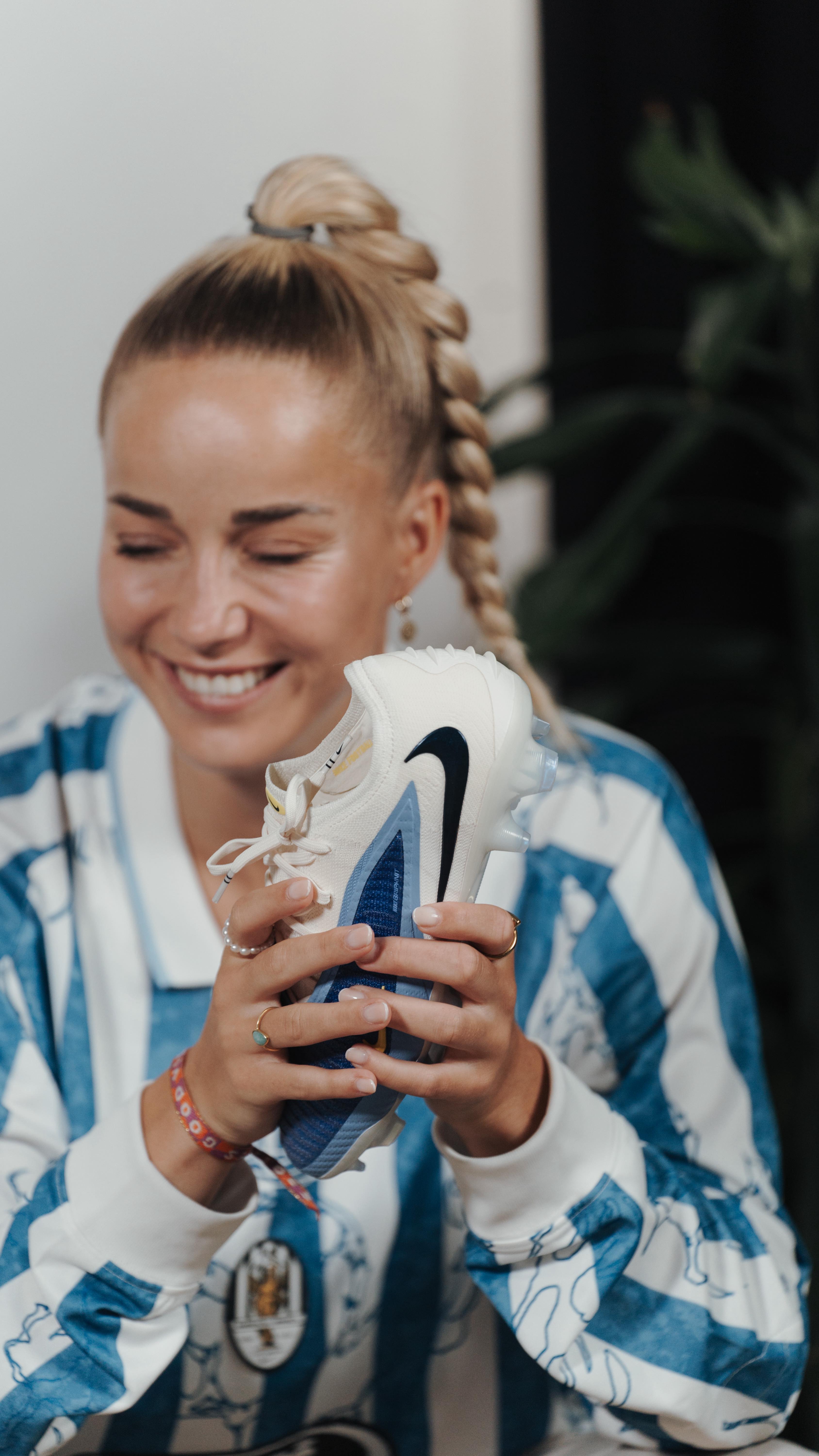 Instagram post by @giuliagwinn for Nike Women. Caption reads: NEW ERA. NEW ENERGY. ⚡️.