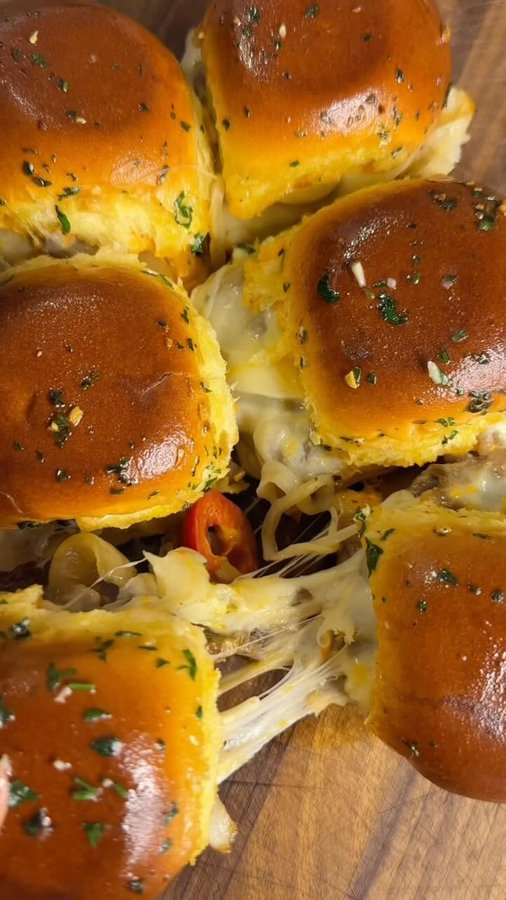 Instagram post by @flavorsbyalessandra for Mezzetta. Caption reads: The Ultimate Philly Cheesesteak Sliders for the....