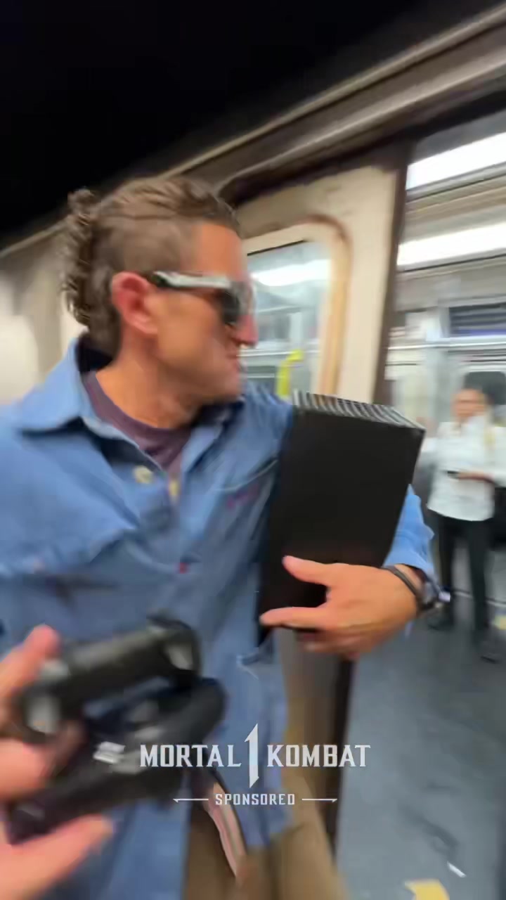 TikTok post by @caseyneistat for Mortal Kombat. Caption reads: Mortal Kombat 1 is out now, check link in bio....