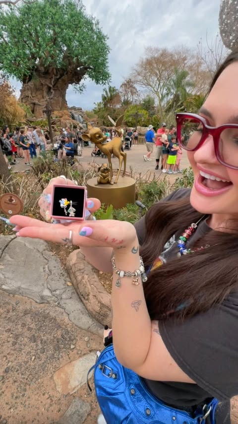 Instagram post by @samtodd for Walt Disney World. Caption reads: [...] collected a charm from all of the....
