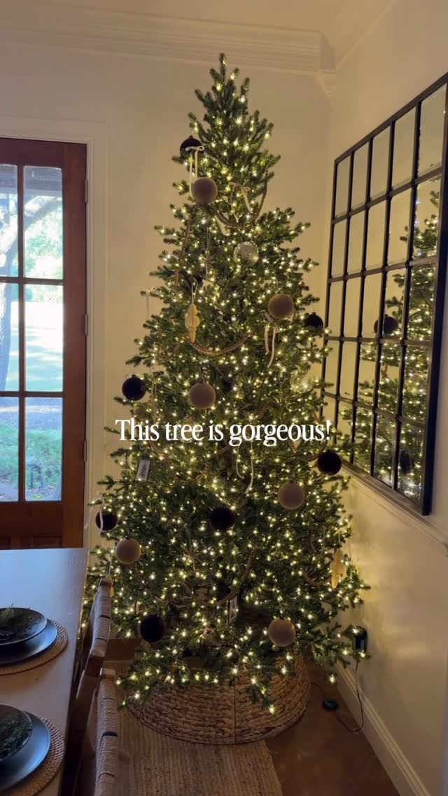 Instagram post by @_cindyswanson_ for The Home Depot. Caption reads: This tree is seriously gorgeous! Warm twinkle....
