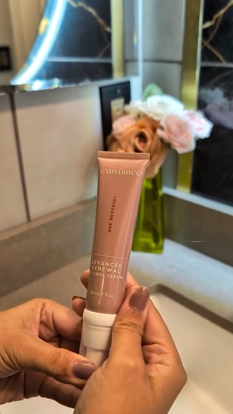 Instagram post by @world_of_erish for Exuviance. Caption reads: [...] AGE REVERSE+ Retinol Serum from @exuviance....