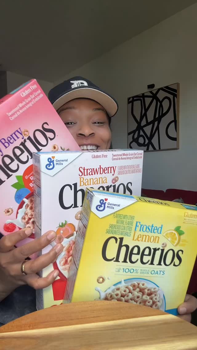 Instagram post by @munchwithdes for Cheerios. Caption reads: Trying Cheerios Strawberry Banana, Very Berry and....