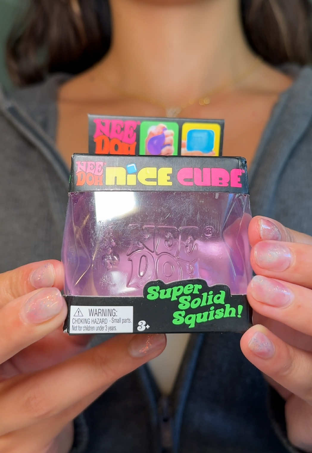 TikTok post by @_juliabedell for NeeDoh (Schylling). Caption reads: these things are ADDICTING. I linked my NeeDoh....