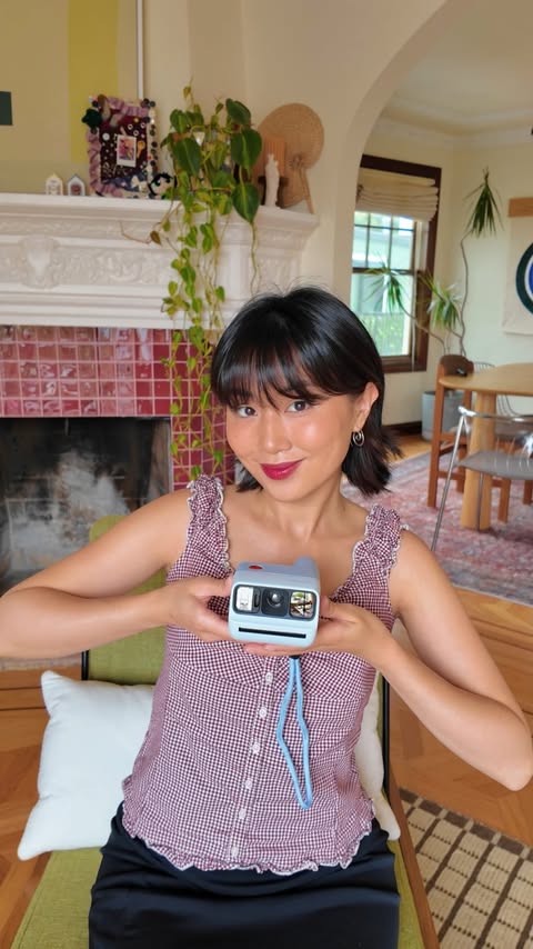 Instagram post by @homegirlhannah_ for Polaroid. Caption reads: [...] the little moments with my new @polaroid go....