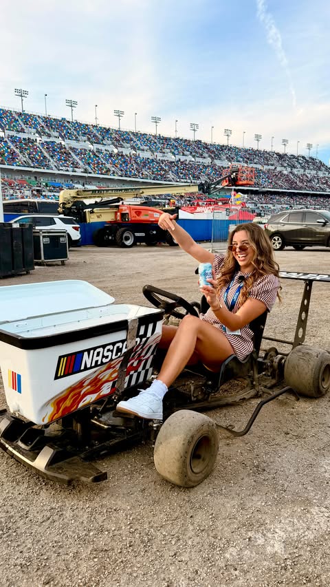 Instagram post by @lolowithrow for NASCAR. Caption reads: @daytona & @nascar put me to work today 🍻‼️ it’s....