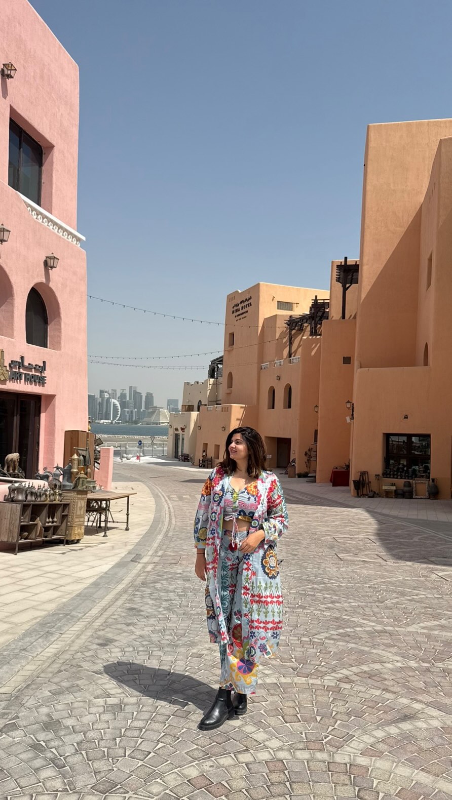 Instagram post by @iampoojasingh_ for Qatar Airways. Caption reads: Flying with Qatar Airways soon? Don’t rush through....