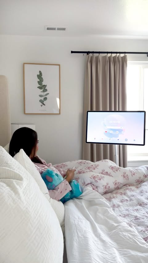 Instagram post by @karinabbingham for Hisense. Caption reads: [...] moves with you. 👀📺 #ad I love the....
