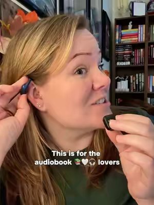 TikTok post by @ashtclaire for Raycon. Caption reads: [...] #audiobooks #audiobooklover #rayconearbuds....