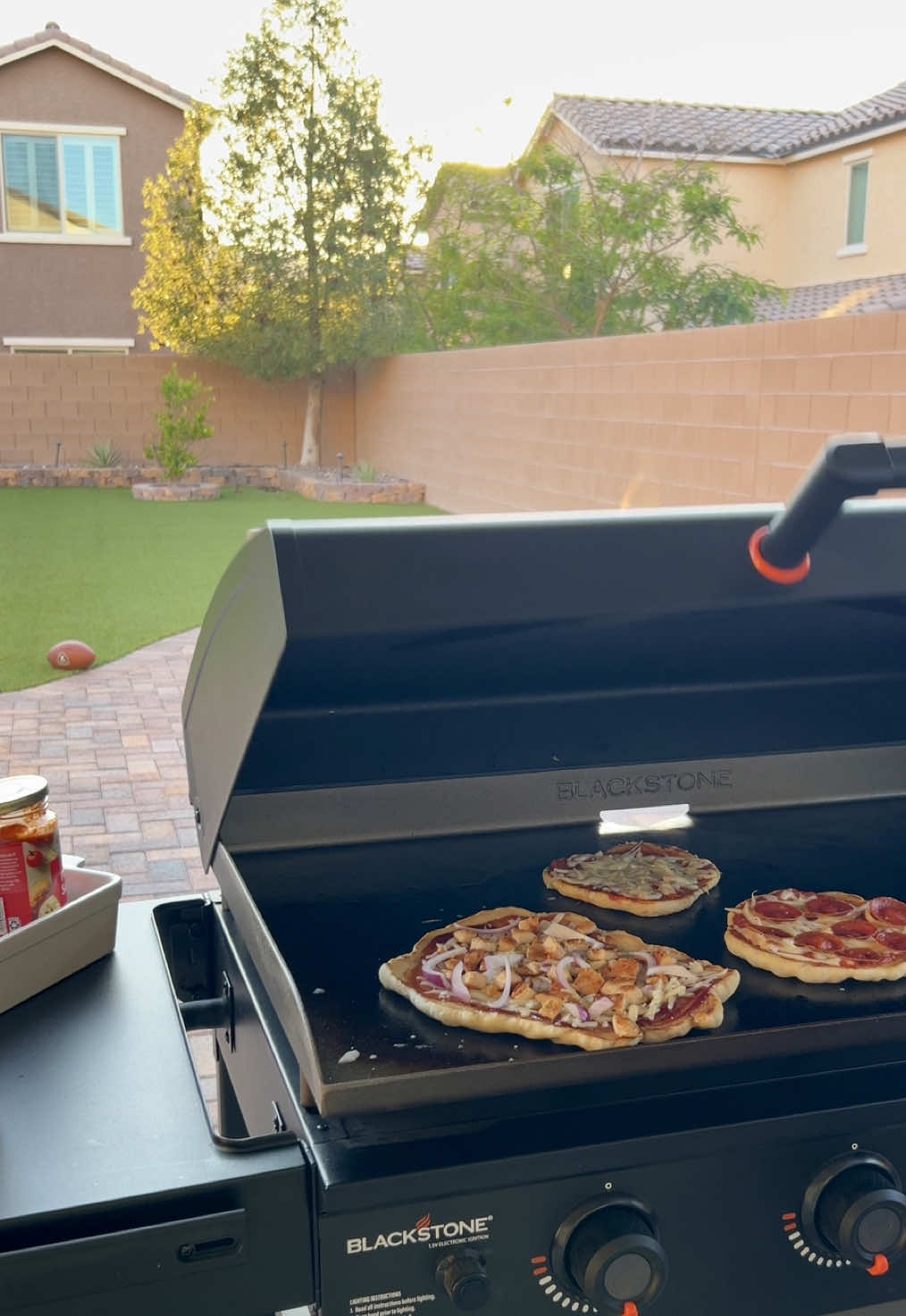 TikTok post by @skillinhome for Wayfair. Caption reads: Pizza night on the Blackstone!🍕✨ A summer....