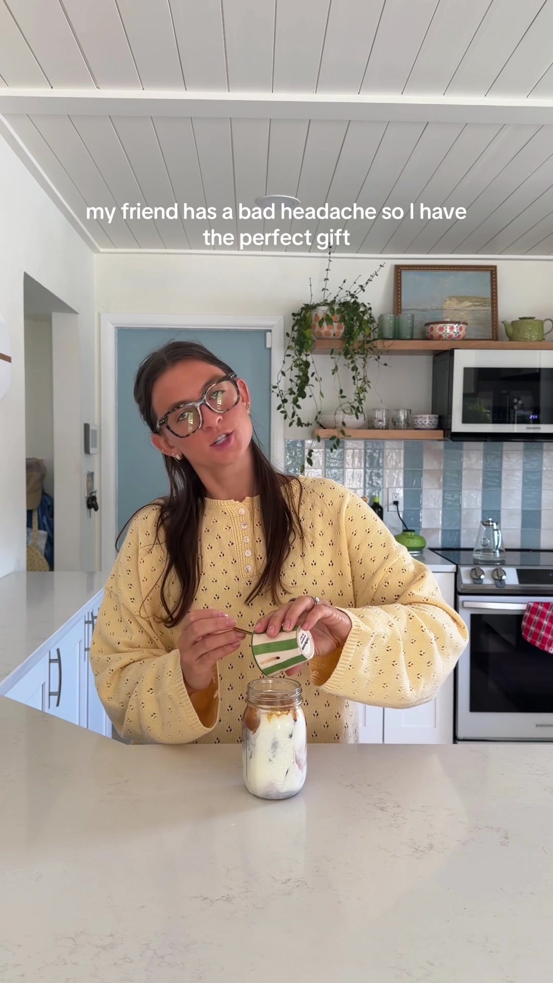 TikTok post by @nataliezacek for Eyebuydirect. Caption reads: caffeine and the cutest @Eyebuydirect blue light....