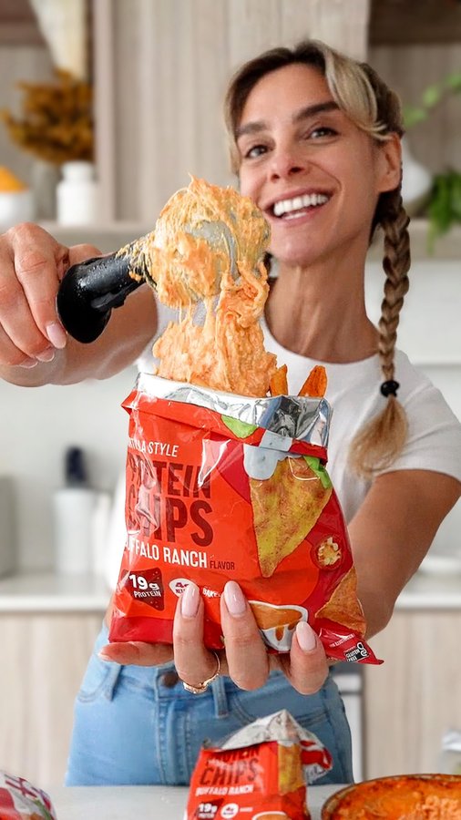 Instagram post by @cheatdayeats for Quest Nutrition. Caption reads: Have you ever tried WALKING TACOS? They are the....