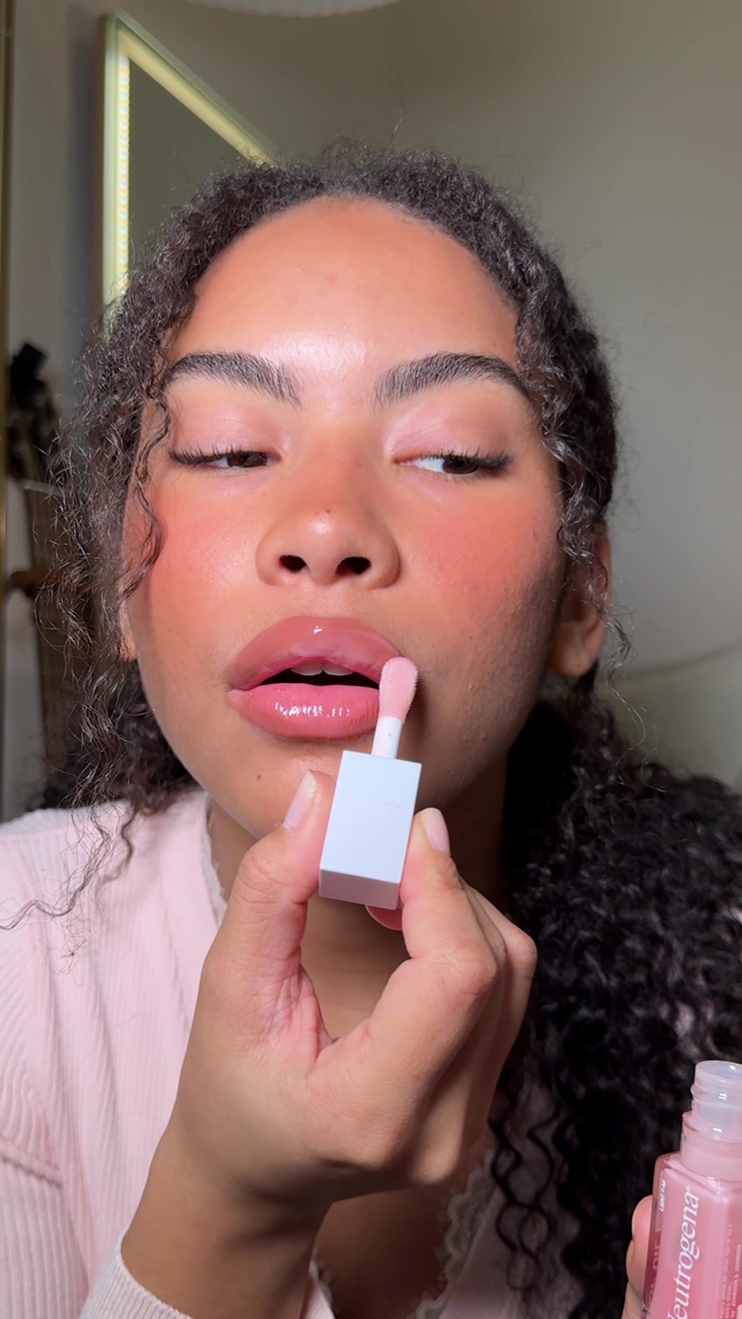 TikTok post by @nikki.bruner for Neutrogena. Caption reads: I can’t get over the shine!!! I’ve been doing this....